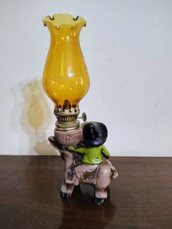 Vintage Ceramic Man on Donkey Oil Lamp
