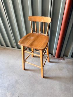 Brown wood high chair