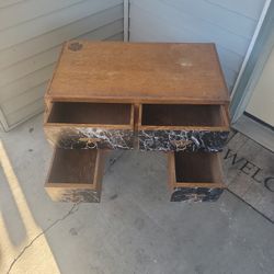 Make Up Desk, or Whatever Desk. 4 Drawers. The only damage is on the top, in pics.