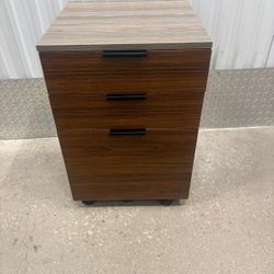 Three 3 drawer File Cabinet wood grain decor. 23” high , 16” Depth , 16” Wide . $50
