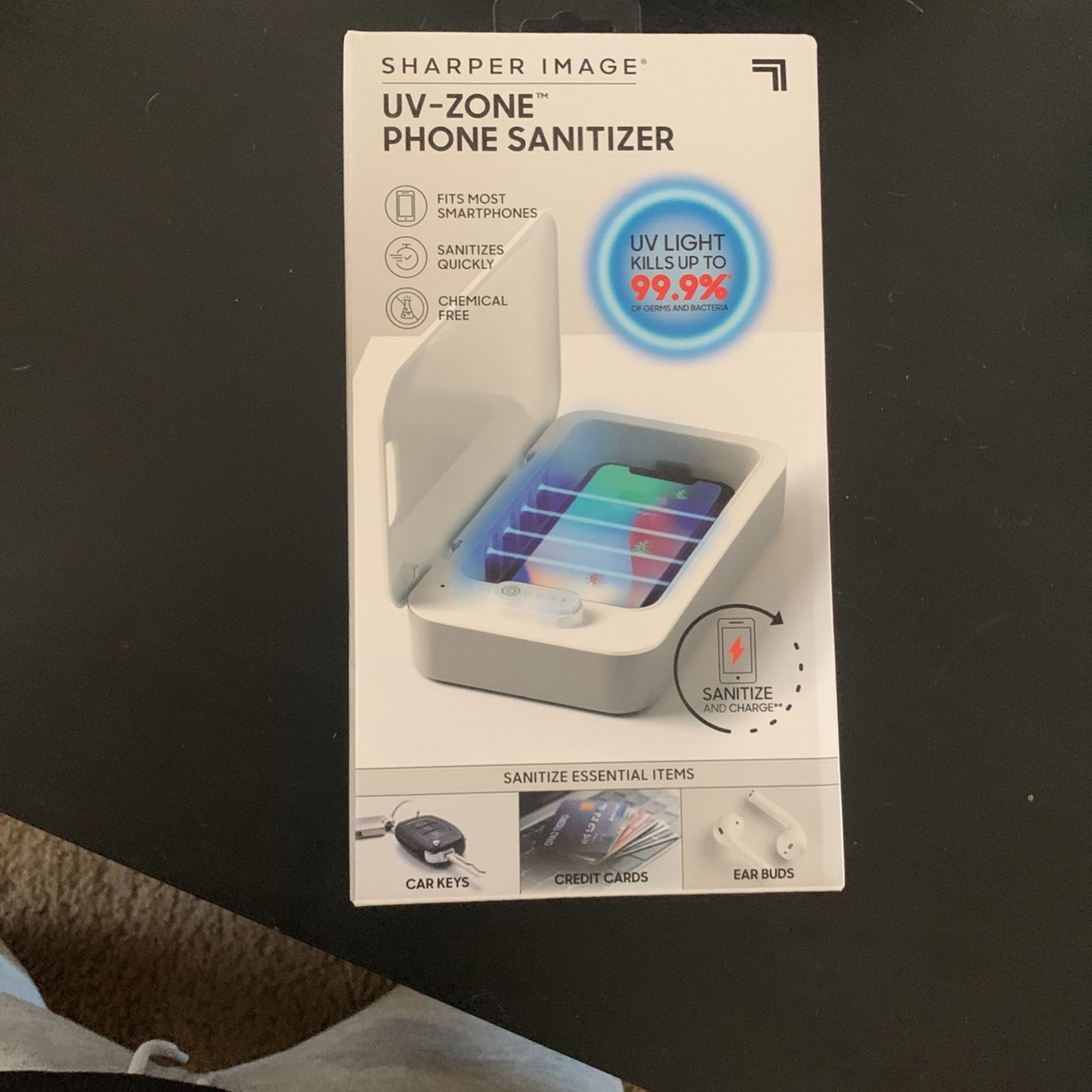 Sharper image UV-Zone Phone Sanitizer/phone Charger (New)