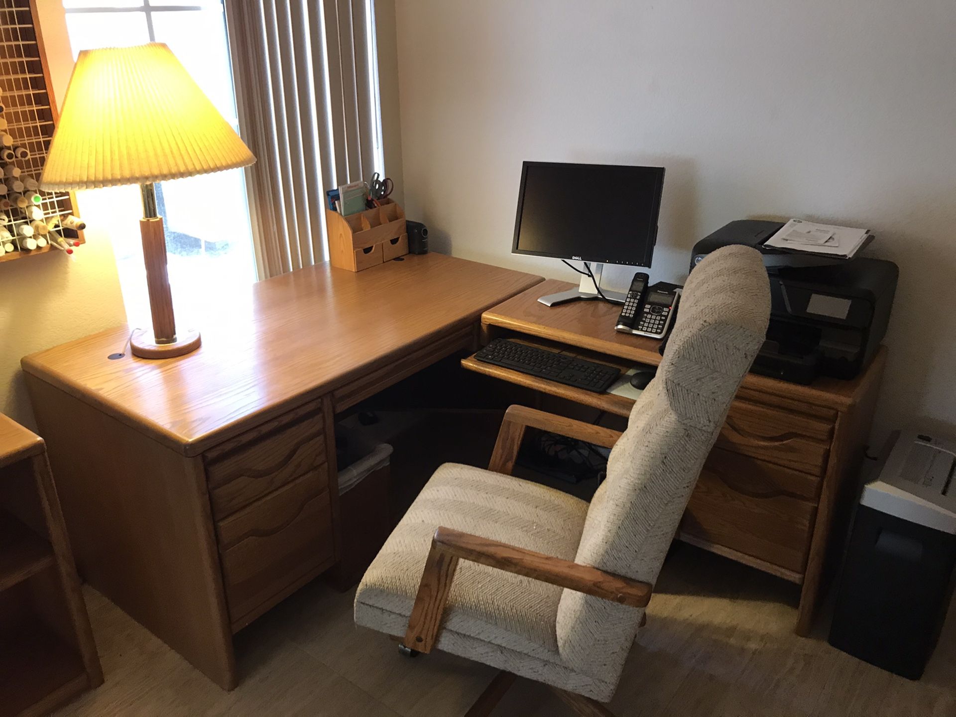 Office furniture complete. Desk, return desk, file cabinet, bookshelf and chair. All included.