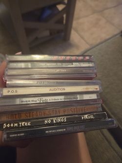 Lot of 9 Used CDs – U2, Rage Against the Machine, P.O.S, and More