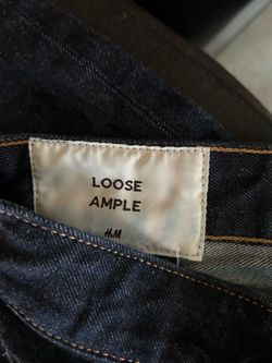 Loose dark blue jeans