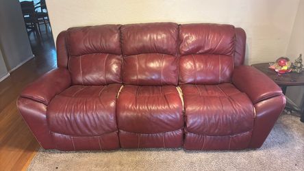 2 red leather couches