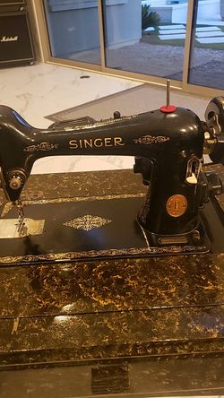 Singer sewing machine with original refinished table