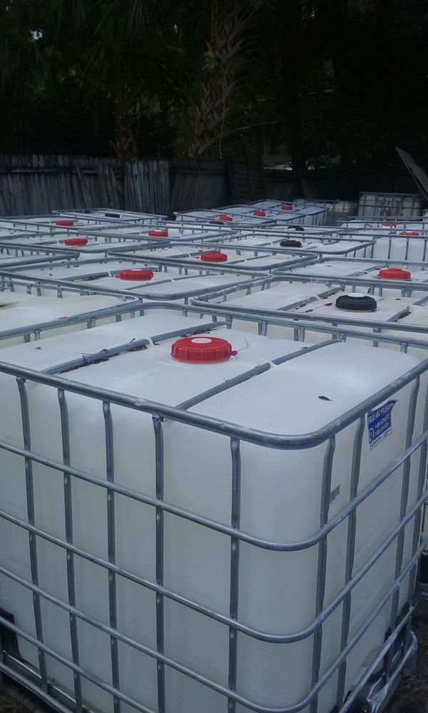 HURRICANE PREP SUPPLIES 275 GALLON IBC WATER TANKS IN STEEL FRAMES