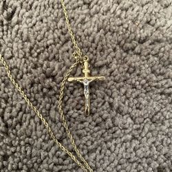 14kt Gold Rope Chain and 14kt Cross Pendant.