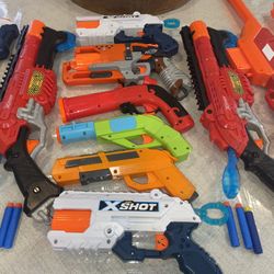 12 ASSORTED NERFSTYLE GUNS ALL WORKING NO BULLETS. RIFLES AND HAND GUNS. SELL AS A LOT NOT SEPARATE.