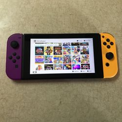 NINTENDO SWITCH V2 + 100 SWITCH GAMES AND 7500 OLD SCHOOL GAMES