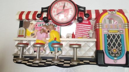 Old soda fountain plastic clock with jukebox