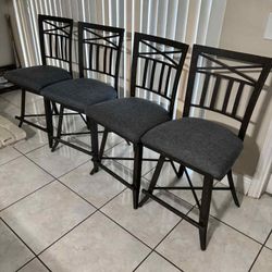 4 Wrought-Iron Swivel Bar Stools