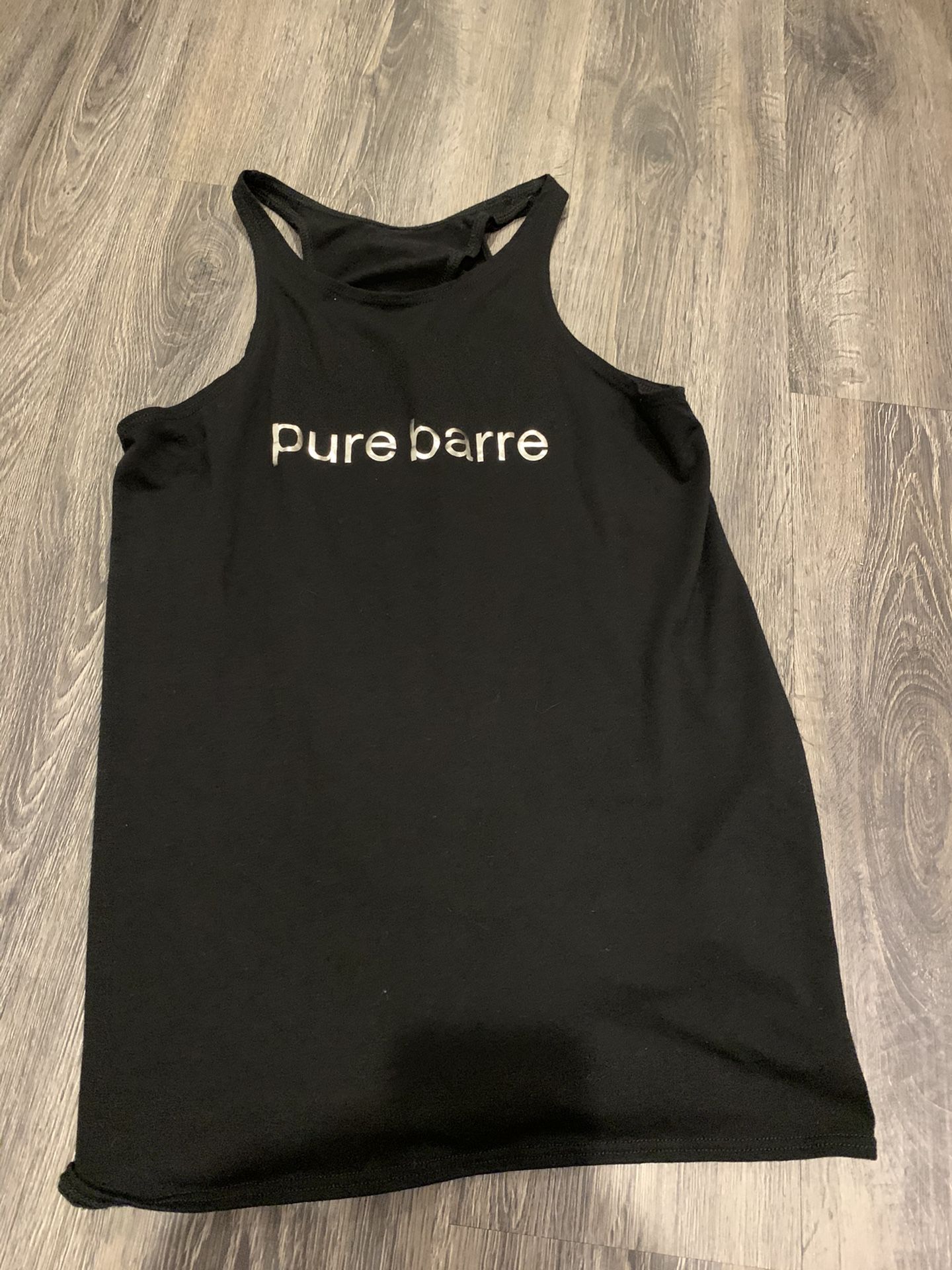 Black PIre Barre Open Back/knot tank. Only worn 3 times. Super soft and flattering! Retailed for $48.