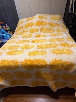 Queen-size blankets typically measure 90 inches by 90 inches