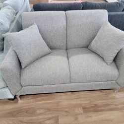 Brand New Loveseat In A Light Brown 
