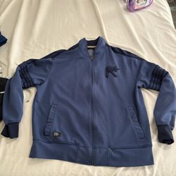 Rocawear Men’s Large Zip Up Jacket . Small Stains $10
