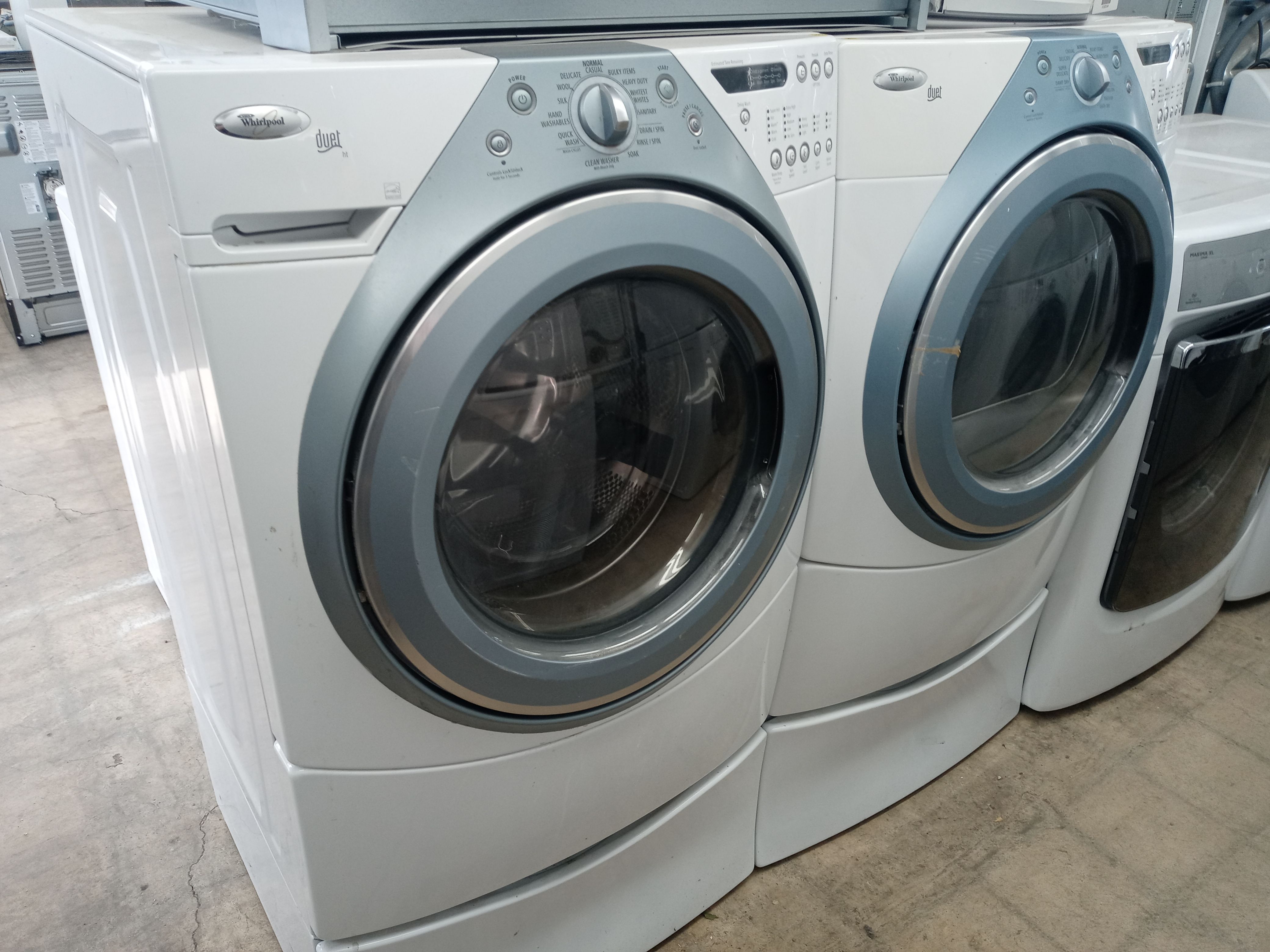 Whirlpool Duet front load washer and dryer set on pedestals - Free delivery
