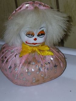 Porcelain clown doll
