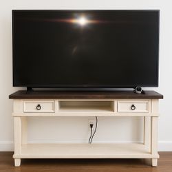 65” Samsung Tv, Cream And Brown Colored Tv Stand With Drawers