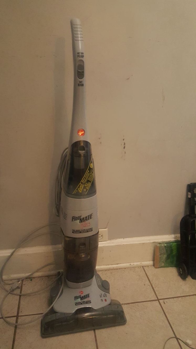 Floor Mate plus hard floor cleaner vacuums washes dries