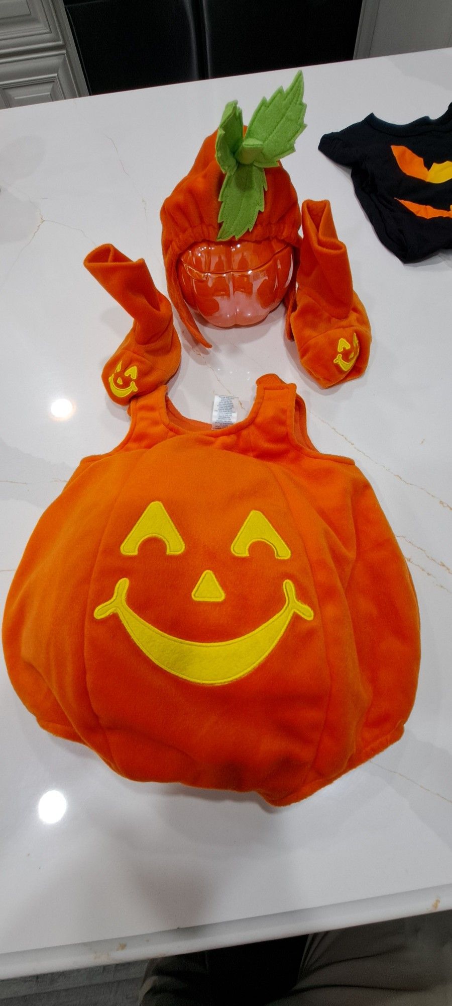 Baby pumpkin costume.