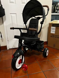 Radio Flyer City 4-in-1 Stroll 'N Trike, for Riders 1-5 Years Old, Black