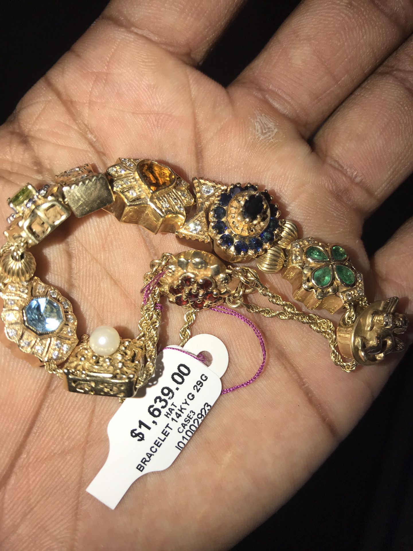 14k Multi Charm bracelet w assorted Diamonds