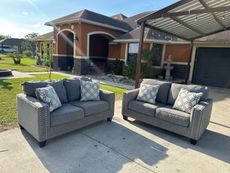 Beautiful grey sofa set super comfy and nice pillows included asking 580