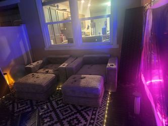 Two indoor outdoor gray couches
