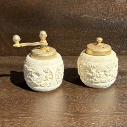 vintage hand-carved salt or pepper grinder.