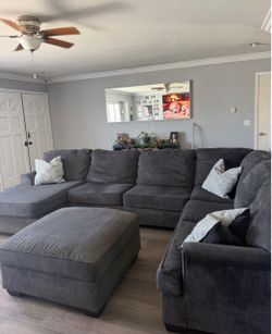 Large grey sectional couch