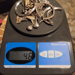 195g 9.25 Silver 6.3 TROY OZ, 1.6G 14KGold single earring with natural diamond $350 OBO 