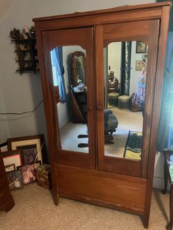 Antique wardrobe with double door mirrors