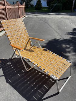Vintage Aluminum Framed Webbed Web Folding Chaise Lounge Chair Yellow Orange Colored Wood Armrests