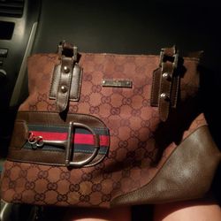Gucci GG Pattern Brown Shoulder Bag with Buckle and Logo Accents