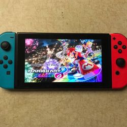 NINTENDO SWITCH V2 with 100 POPULAR SWITCH GAMES MARIO PARTY,MARIO KART,ZELDA,POKEMON,MINECRAFT and More