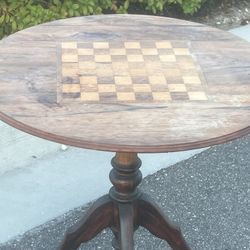 Antique Mahogany Chess Tilt Top Table 28.5 inches Diameter Nice. Used in good condition with some cosmetic blemishes. These blemishes are in the form 