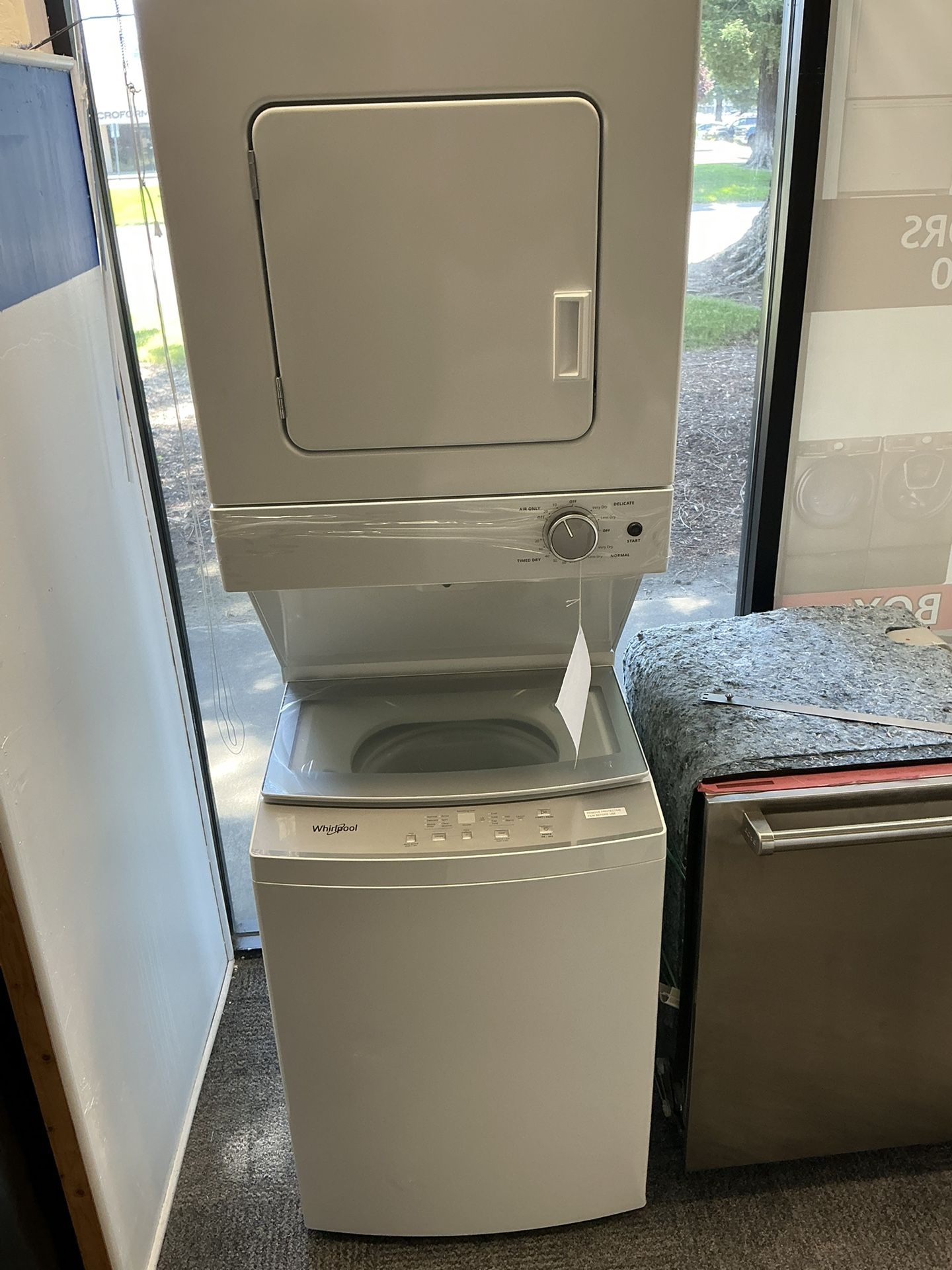 Whirlpool Stacked Laundry Center with 1.6-cu ft Top load Washer and Electric 3.4-cu ft Dryer