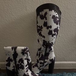 Cow print high boots 