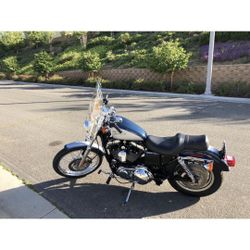 **** Reduced. *****Beautiful 2002 Harley Davidson sportster custom 1200. It’s a must-see bike for anyone who enjoys riding. Original owner