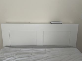 Ikea Brimnes white headboard with integrated storage