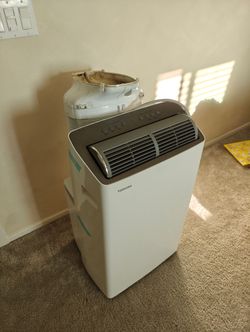Toshiba Portable Air Conditioner — Model RAC-PT1412HVWRU