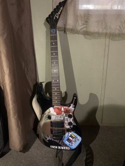 Small Collection Of Guitars