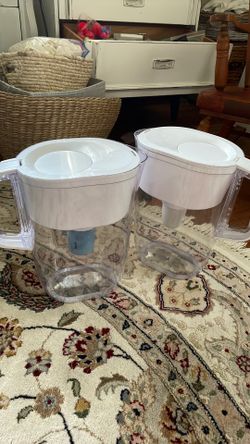 Two Brita water pitchers