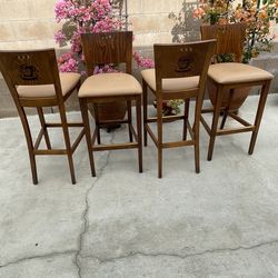 Countertop /barstool chairs in very good condition , normal wear , leather upholstery set of four
