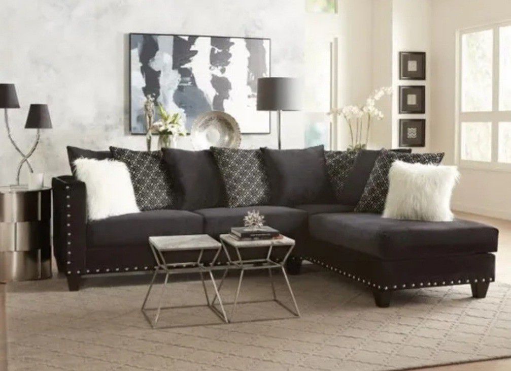 Black Sectional with Decorative Pillows 