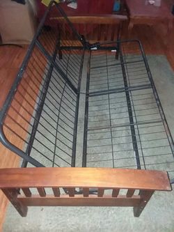 Wooden and Metal Futon lightweight.