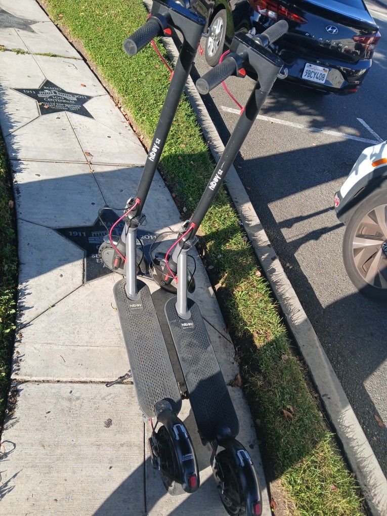 Pair Of Electric Scooters 
