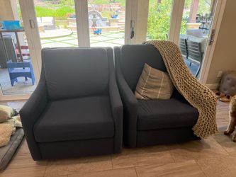 Blue swivel accent chairs