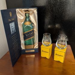 Vintage Whiskey Bottle And Tasting Glasses